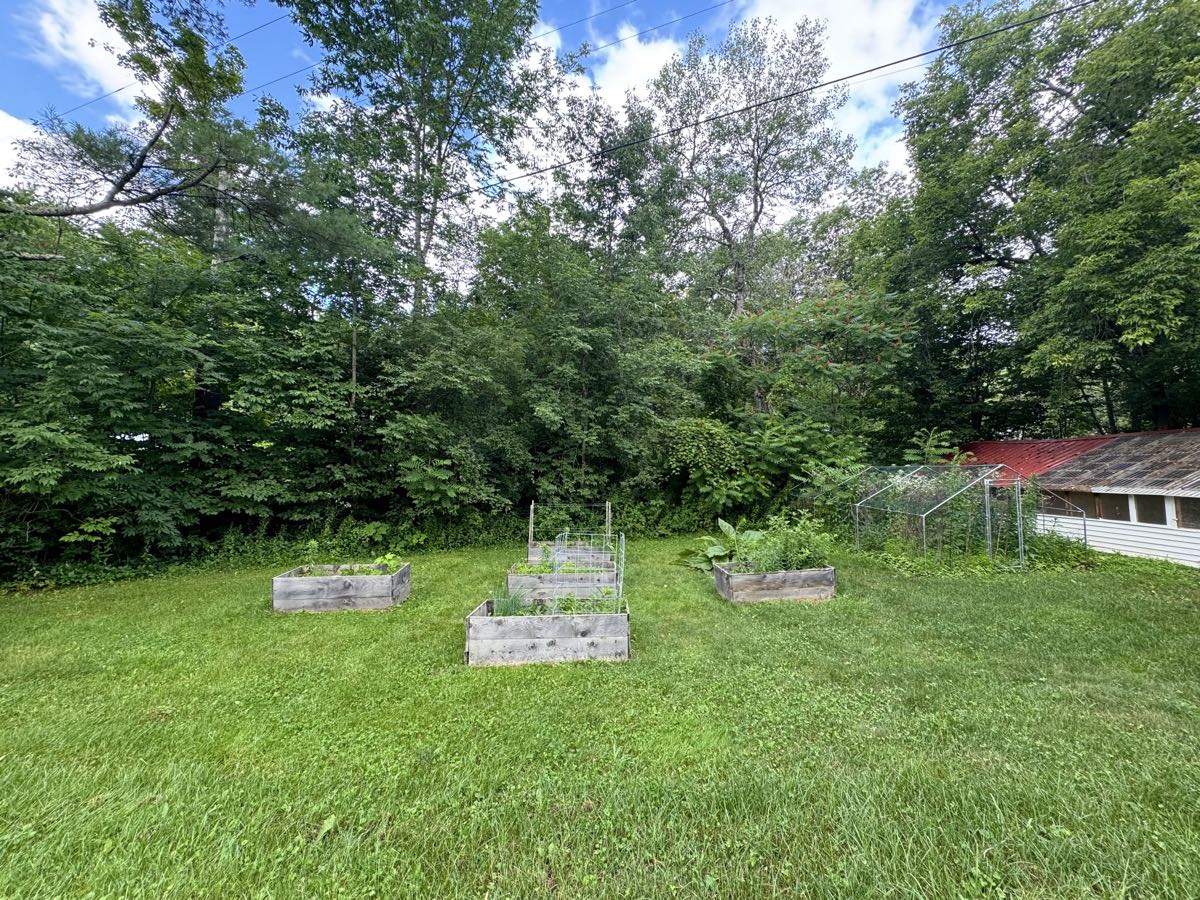 Raised garden beds on the property, growing produce for farm-to-table dinners